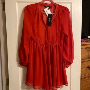 Sheer button down dress in dark Orange . Size medium